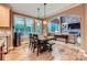 Cozy dining area with a view of the covered patio and the living room at 2215 Maycroft Dr, Charlotte, NC 28262