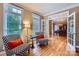 Inviting sitting room leading to dining room with natural light and stylish decor at 2215 Maycroft Dr, Charlotte, NC 28262