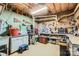 Unfinished basement with work benches, storage shelves and vintage accents at 2215 Maycroft Dr, Charlotte, NC 28262