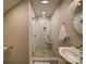 Modern bathroom with a glass-enclosed shower, stylish tile, and updated fixtures at 226 Union S St, Concord, NC 28025