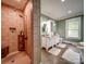 Beautiful bathroom featuring a walk-in shower, a double vanity and soaking tub at 226 Union S St, Concord, NC 28025