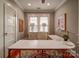 Bright home office with hardwood floors, a modern desk, and ample natural light at 226 Union S St, Concord, NC 28025