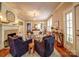 Inviting living room featuring hardwood floors, a cozy fireplace, and ample natural light at 226 Union S St, Concord, NC 28025