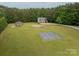 Spacious yard featuring gazebo, garage with apartment, and covered pool at 2609 Cove Creek Dr, Gastonia, NC 28056