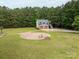 Aerial view of the garage with apartment, gazebo and patio with fire pit at 2609 Cove Creek Dr, Gastonia, NC 28056
