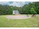Exterior features a two-car garage with a patio and fire pit at 2609 Cove Creek Dr, Gastonia, NC 28056