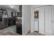 Convenient laundry room with modern appliances, shelving, and ample storage space at 2609 Cove Creek Dr, Gastonia, NC 28056