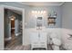 Well appointed bathroom featuring modern fixtures, fresh paint, and hardwood floors at 303 Island Ford Rd, Maiden, NC 28650