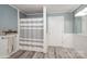 Bright bathroom featuring a shower and bath with gray accents, and modern fixtures at 303 Island Ford Rd, Maiden, NC 28650