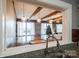 Open kitchen with eat-in bar area that features an indoor view to living area at 303 Island Ford Rd, Maiden, NC 28650