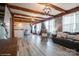 Inviting living room with hardwood floors, exposed beams, and a comfortable seating area at 303 Island Ford Rd, Maiden, NC 28650