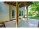 A covered patio with concrete floor, structural beams, and a yard view at 319 Beacon Hills Dr, Gastonia, NC 28056