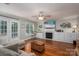 Comfortable living room with fireplace and a large window with natural light at 319 Beacon Hills Dr, Gastonia, NC 28056