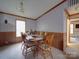 Inviting dining room with a chandelier and a wooden table set for six at 3750 Turner Rd, Clover, SC 29710