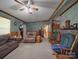 Comfortable living room with a ceiling fan and stone fireplace at 3750 Turner Rd, Clover, SC 29710