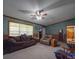 Cozy living room featuring a ceiling fan and comfortable seating, perfect for relaxing and entertaining at 3750 Turner Rd, Clover, SC 29710