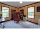 Inviting office space with two windows, bookshelves, and comfortable seating, creating an ideal workspace at 3750 Turner Rd, Clover, SC 29710