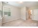 Bedroom with natural light, neutral walls and an en-suite bathroom at 4324 Falls Lake Sw Dr, Concord, NC 28025