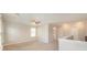 Bonus room with a ceiling fan and lots of natural light at 4324 Falls Lake Sw Dr, Concord, NC 28025