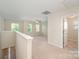 Bright bonus room with natural light coming from the windows at 4324 Falls Lake Sw Dr, Concord, NC 28025
