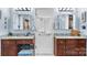 Bathroom featuring granite counters, double sinks, and ample vanity storage at 4647 16Th Street Ne Pl, Hickory, NC 28601