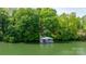 Water view of the covered dock on the lake at 4647 16Th Street Ne Pl, Hickory, NC 28601