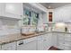 Elegant kitchen featuring granite counters, stainless steel appliances, and custom cabinetry for a sleek and stylish design at 4647 16Th Street Ne Pl, Hickory, NC 28601