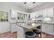 Lovely kitchen with granite counters, center island with seating, modern appliances, and white cabinets at 4647 16Th Street Ne Pl, Hickory, NC 28601