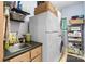 Laundry room features a side-by-side washer and dryer, a utility sink, and storage shelves at 4647 16Th Street Ne Pl, Hickory, NC 28601