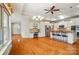 Spacious kitchen featuring white cabinets, stainless steel appliances, and hardwood floors at 5028 Polo Gate Blvd, Charlotte, NC 28216