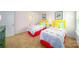 Comfortable bedroom with two twin beds, cheerful decor, and a bright atmosphere, perfect for  at 545 Stroupe Rd, Gastonia, NC 28056