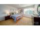 Bright bedroom featuring a large window, comfortable furnishings, and ample natural light at 545 Stroupe Rd, Gastonia, NC 28056