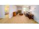 Bright bonus room with neutral carpet, stylish furniture and decor, creating a cozy and inviting space at 545 Stroupe Rd, Gastonia, NC 28056