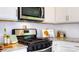 Kitchen with granite counters, stainless appliances and sleek subway tile backsplash at 545 Stroupe Rd, Gastonia, NC 28056