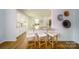 Open-concept kitchen with a breakfast bar, granite countertops, and stainless steel appliances at 545 Stroupe Rd, Gastonia, NC 28056
