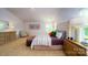 Cozy main bedroom with natural light, neutral carpet, and stylish furnishings at 545 Stroupe Rd, Gastonia, NC 28056