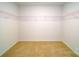 Spacious walk-in closet with wire shelving and neutral carpet flooring at 545 Stroupe Rd, Gastonia, NC 28056