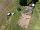 An aerial shot of a yard with a coop, chicken house, and a garden at 5710 Lander Benton Rd, Unionville, NC 28110
