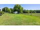Beautiful backyard featuring a storage shed and a sturdy wooden fence at 5710 Lander Benton Rd, Unionville, NC 28110