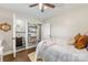 Bedroom includes ensuite bathroom, bed with decorative pillows and rustic decor at 5710 Lander Benton Rd, Unionville, NC 28110