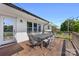 Spacious back deck with seating, ideal for entertaining and enjoying the outdoor ambiance at 5710 Lander Benton Rd, Unionville, NC 28110