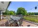 Outdoor deck with a metal table and chairs, perfect for enjoying the backyard view at 5710 Lander Benton Rd, Unionville, NC 28110
