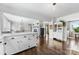 Open-concept living space with a fireplace and lots of natural light at 5710 Lander Benton Rd, Unionville, NC 28110