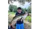 Happy Fisherman with fish find in the pond at 5710 Lander Benton Rd, Unionville, NC 28110