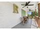 Covered front porch featuring ceiling fans, bench seating, and a vintage, charming decor at 5710 Lander Benton Rd, Unionville, NC 28110
