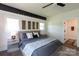 Stylish bedroom with a large bed, neutral decor, and an en-suite bathroom at 5777 Stephanie St, Charlotte, NC 28212