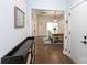 Open-concept foyer with hardwood floors leads to the dining area, showcasing modern design at 5777 Stephanie St, Charlotte, NC 28212