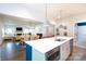 Spacious kitchen flows into the dining and living areas, creating an inviting open-concept living space at 5777 Stephanie St, Charlotte, NC 28212