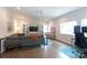 Bright living room with hardwood floors and cozy seating at 5777 Stephanie St, Charlotte, NC 28212