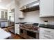 Well-equipped kitchen with stainless steel appliances, a subway tile backsplash, and plenty of counter space at 5822 Alexa Rd, Charlotte, NC 28277